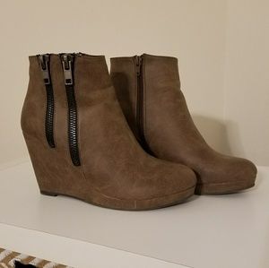 Brown booties with double zipper detail